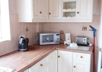 Chester kitchen units refinished in 'New White'