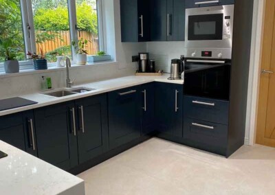 Kitchen resprayed in Basalt from the Little Greene Paint Company