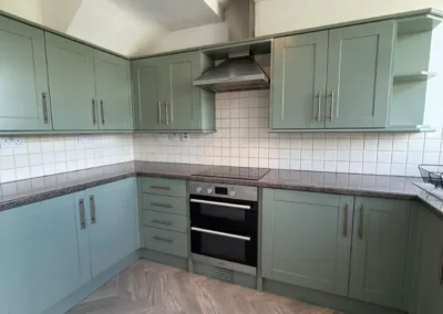 Helsby kitchen units resprayed with Card Room green.